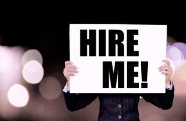 Placard saying Hire Me