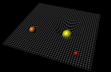 Illustration of spacetime curvature, showing that more massive objects bend the fabric of space and time more than objects with less mass. Physicists define mass as “resistance,” not weight. Image: European Space Agency.